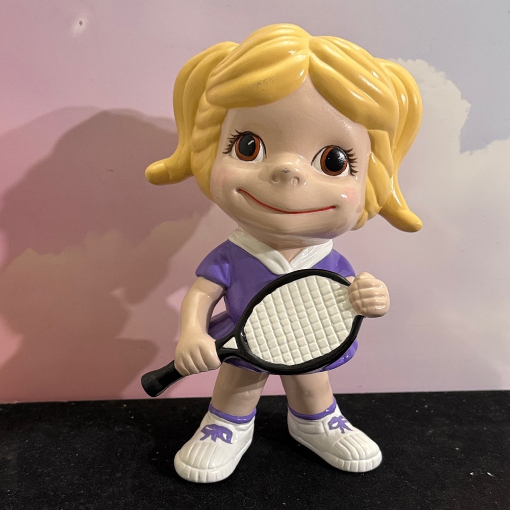 Vintage ceramic figurine of a young girl tennis player 1970-80’s